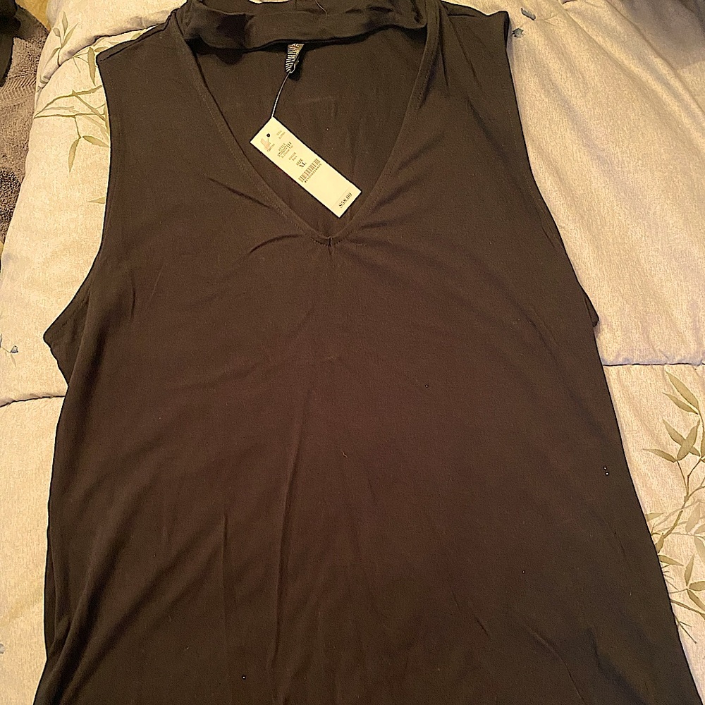 Brand new top, never worn. Very comfortable!